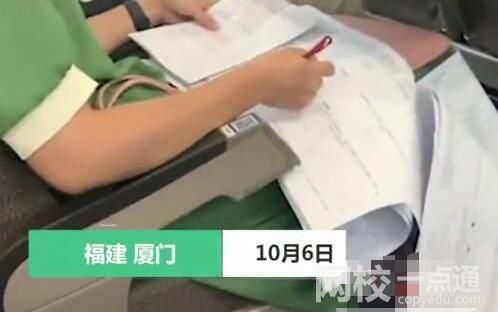 老師在返程高鐵上賣力改試卷 具體是什么情況?